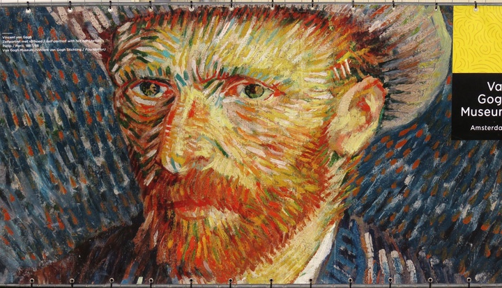 A self portrait of Van Gogh on a banner
